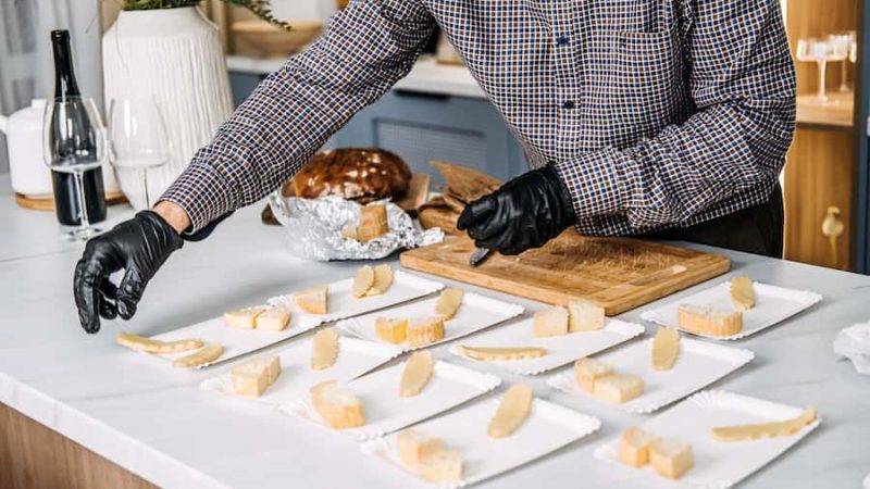 catering-professional-arranging-cheese-plates-for-2024-01-03-00-55-30-utc (1)